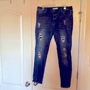 Kancan jeans with Buffalo Plaid rips exclusively for Maurice